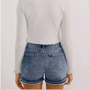 Distressed blue Jean shorts